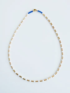 Stella Enamel Tube Necklace - White & Gold with Blue Cord