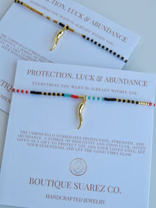 Abigail Cornicello  Bracelet - Protection. Luck & Abundance - Black, Red, Blue & Gold