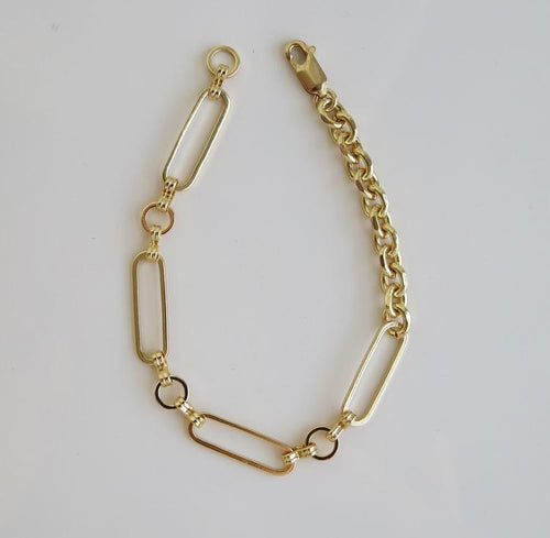 A Bracelet that is Elegant, Classic, Modern and Unique. The Necklace is a Gold Filled chain link with circular links, oval links and faceted cable links that include our Valencia & Versailles Chains. Gold filled from Italy, USA and China. Available in many sizes and if you would like a different size please contact us. 